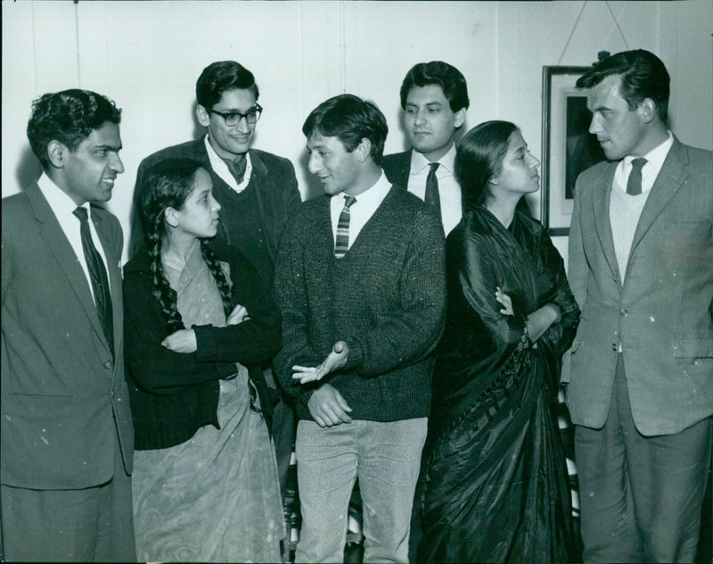 Graduates of OX Univ celebrate with their societies after achieving an impressive 173% D7 DOCTO. - Vintage Photograph