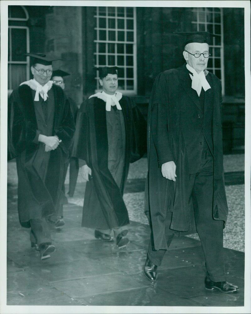 Students gather outside Oxford University's Convocation House to cast their ballots in the 1960 Chancellor election. - Vintage Photograph