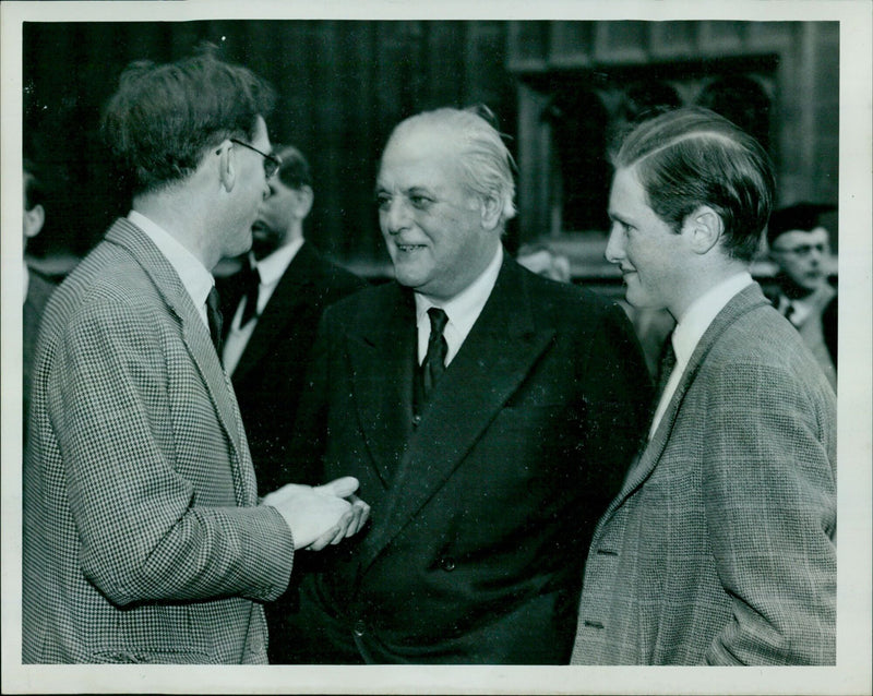 Professor Hugh Trevor-Roper (left) conversing with Randolph Churchill and his son Winston outside the Divinity School at Christ Church. - Vintage Photograph