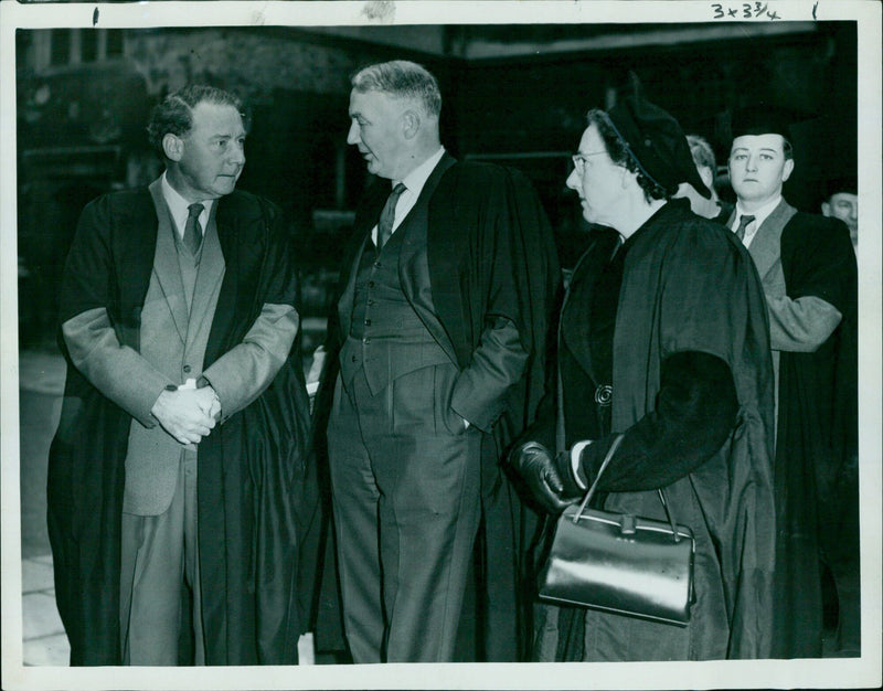 British Labour Party leader Hugh Gaitskell and the Wheatcrofts wait in line to vote in the Chancellor election. - Vintage Photograph