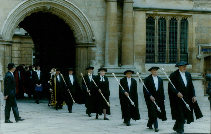 Musicians from Balliol College, Oxford, join in a procession to the Sheldonian Theatre. - Vintage Photograph