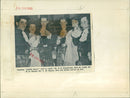 Six people gather to toast the poet Robert Burns. - Vintage Photograph