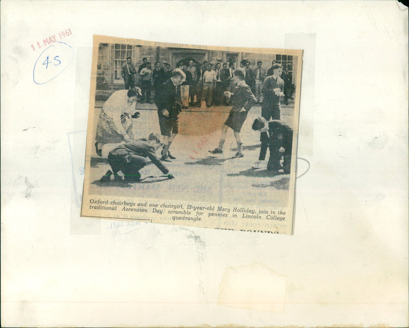 Oxford choirboys and one choirgirl join in the traditional Ascension Day scramble for pennies. - Vintage Photograph