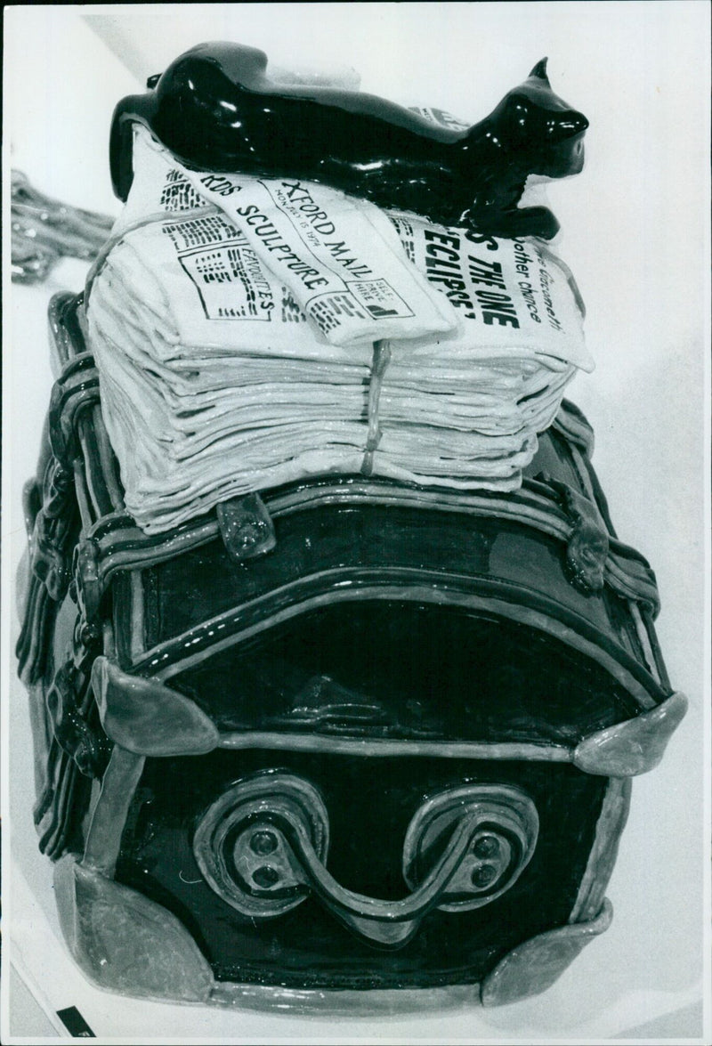 A ceramic art piece entitled "Behind the Times" created by Francis Hewlett is on display at the Oxford Gallery. - Vintage Photograph