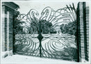 The Swan Gates of St Hugh's College are seen against a newly planted lime avenue and carriage drive. - Vintage Photograph