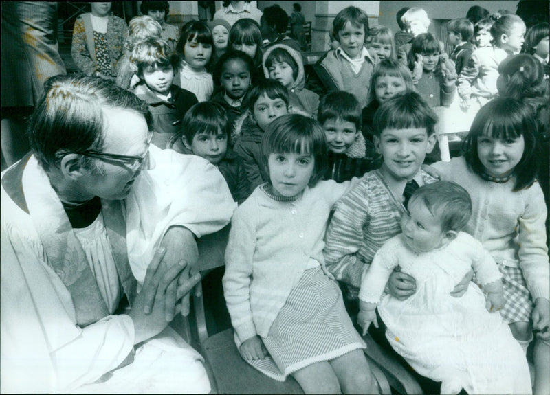 A group of people gathered for a christening ceremony. - Vintage Photograph