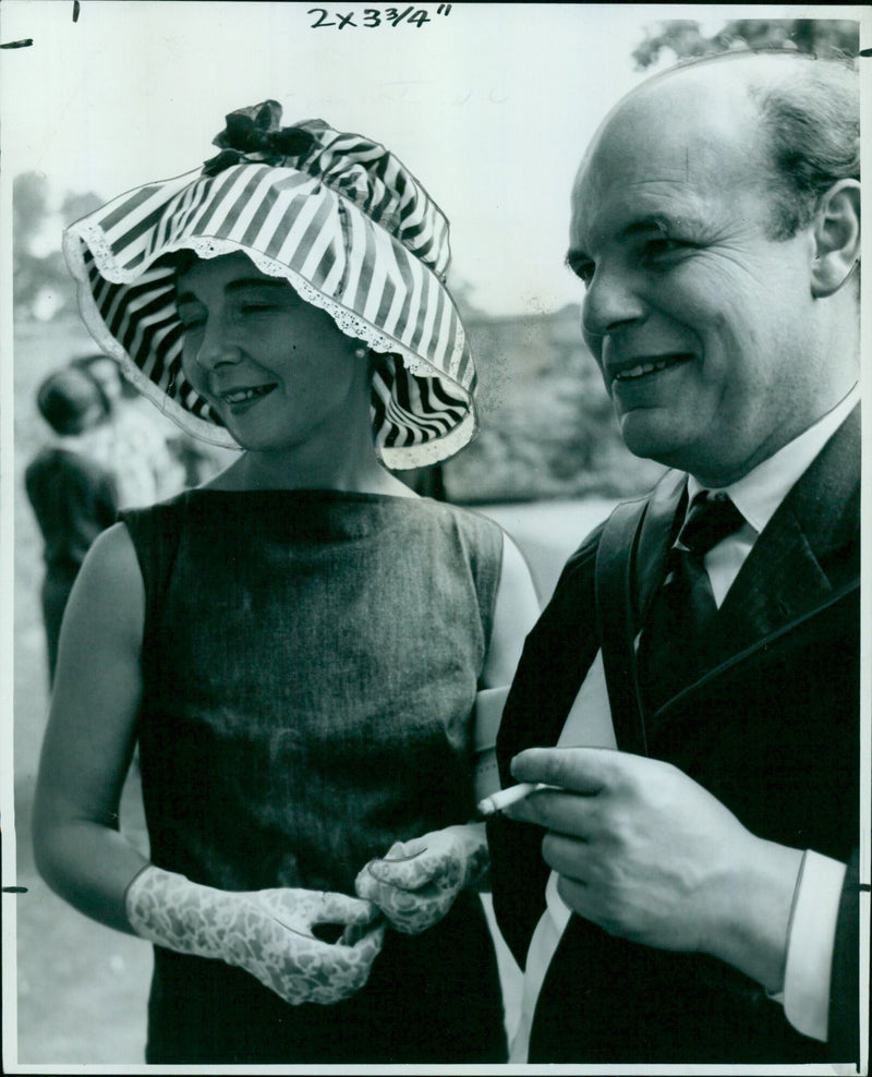 Mr. Peter Swann and his wife pictured at a garden party in Oxford. - Vintage Photograph