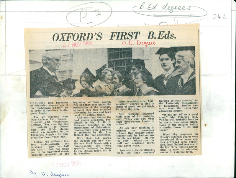 Oxford University's first B.Ed. graduates step out of the Sheldonian Theatre wearing their new beetle-green hoods. - Vintage Photograph