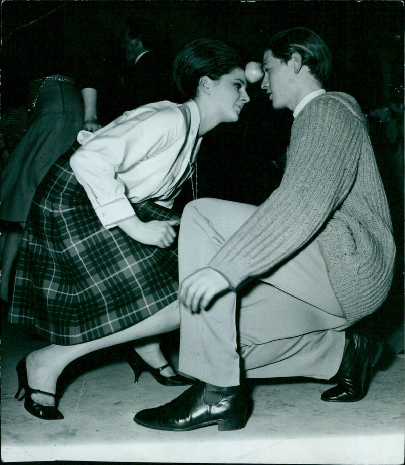 A man and a woman dancing in Memory Lane, Oxfordshire. - Vintage Photograph