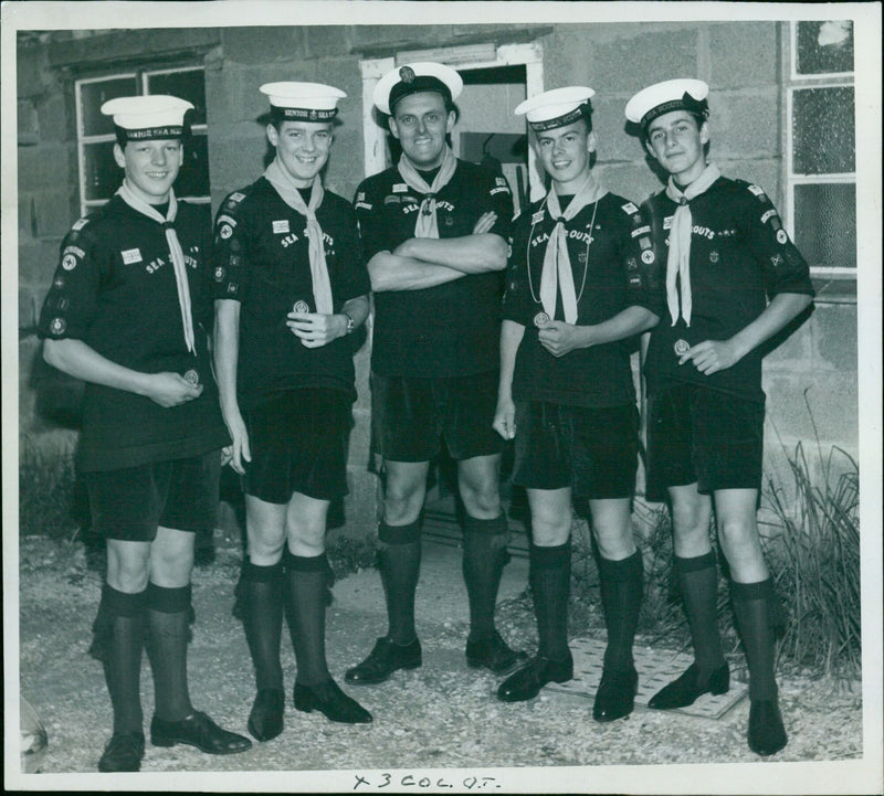 Four senior Sea Scouts of the 40th Oxford Troop receive Queen's Scout Badges. - Vintage Photograph