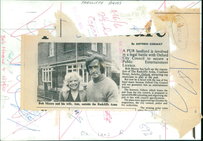 Bob Moore and his wife Ann stand outside the Radcliffe Arms pub in Oxford, England, where he is engaged in a legal battle to secure a Public Entertainment Licence. - Vintage Photograph