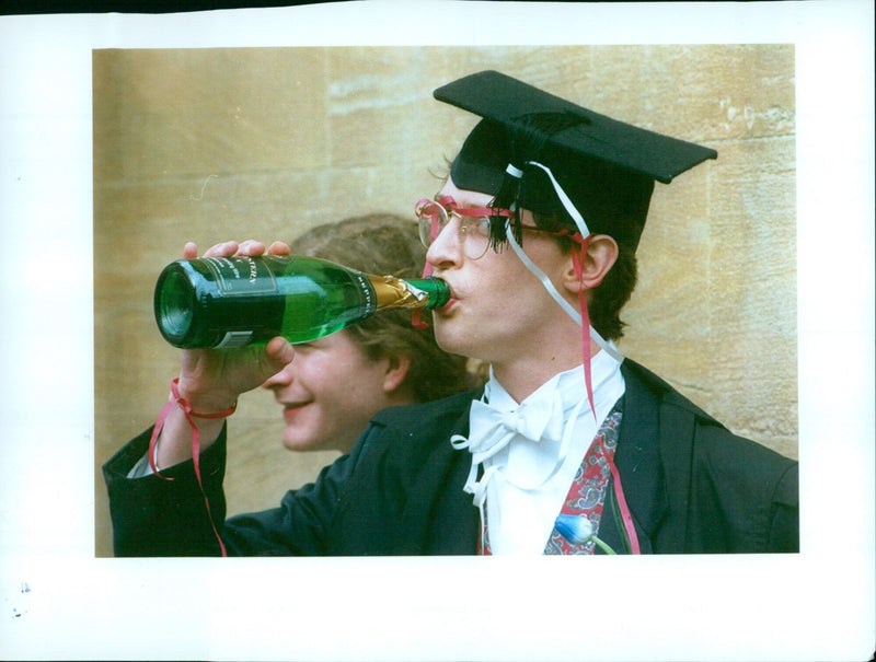 Students at Oxford University take an exam. - Vintage Photograph