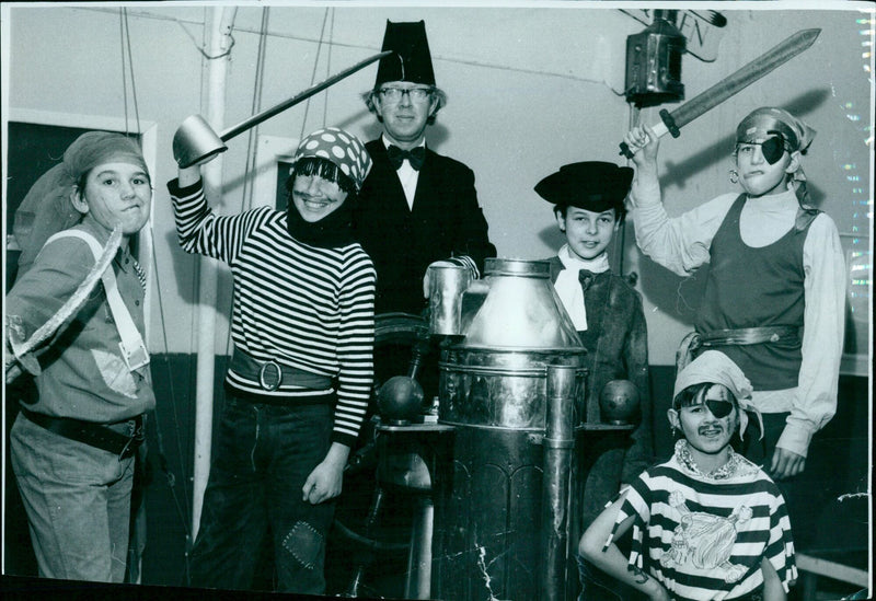 A man wearing a pirate costume attends a Scolex 3 party in London on January 21, 1974. - Vintage Photograph