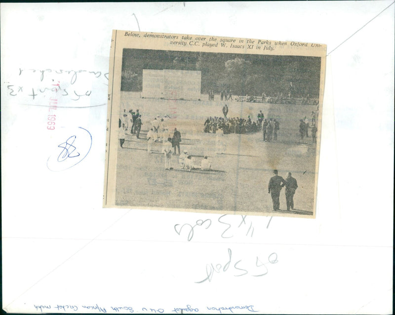 Demonstrators take over the square during a cricket match at Oxford University. - Vintage Photograph