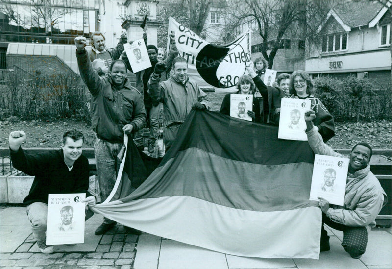 Members of the Oxford City Anti-Apartheid group celebrate Nelson Mandela's release from prison in Bonn Square. - Vintage Photograph