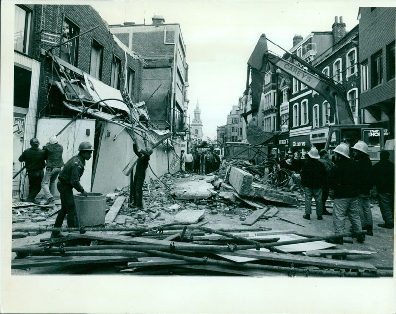 Workers clear debris following a storm in Vienna, Austria. - Vintage Photograph