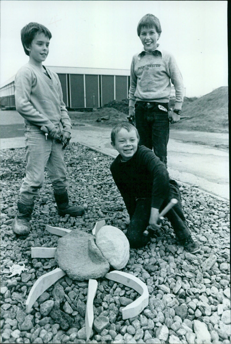 Three after-school sculptors pose with a model of their sculpture. - Vintage Photograph