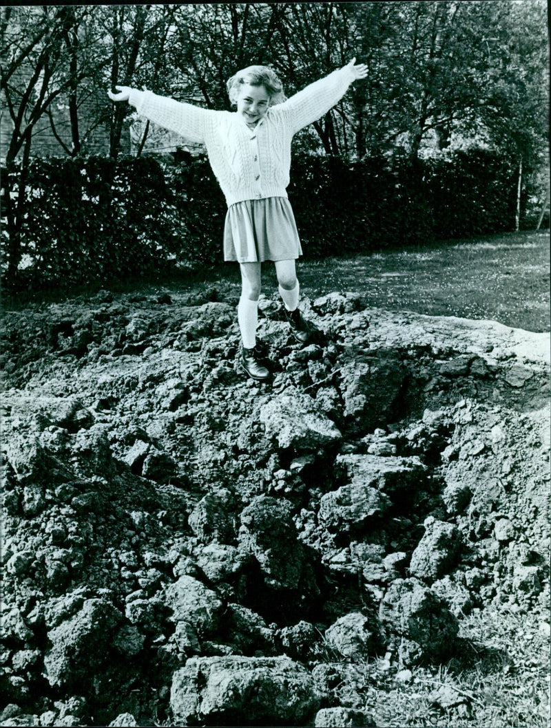 Stephanie Litton, 8, at the St Ebbe's School grounds as the beginnings of an amphitheatre are dug up. - Vintage Photograph