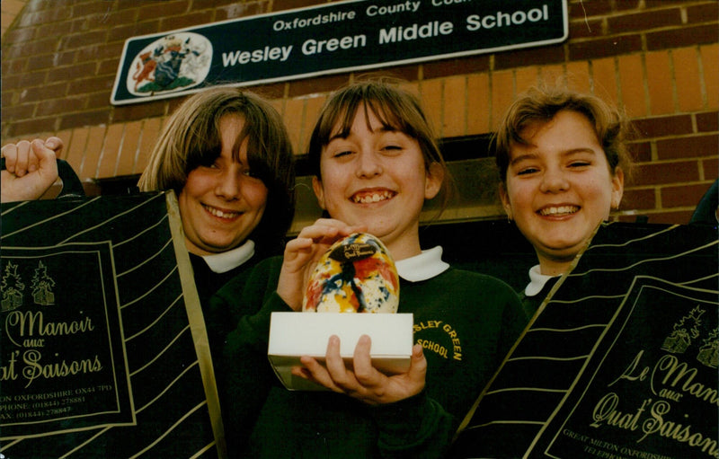 Three Wesley Middle School pupils learn how to make chocolate mousse from world-renowned chef Raymond Blanc at Le Manoir aux Quat Saisons in Oxfordshire. - Vintage Photograph