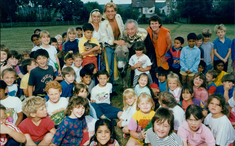 The cast of Chic Ox. Schools' production of 'St. Ebbes Joseph and His Amazing Coloured Coat' visit St Ebbes school. - Vintage Photograph