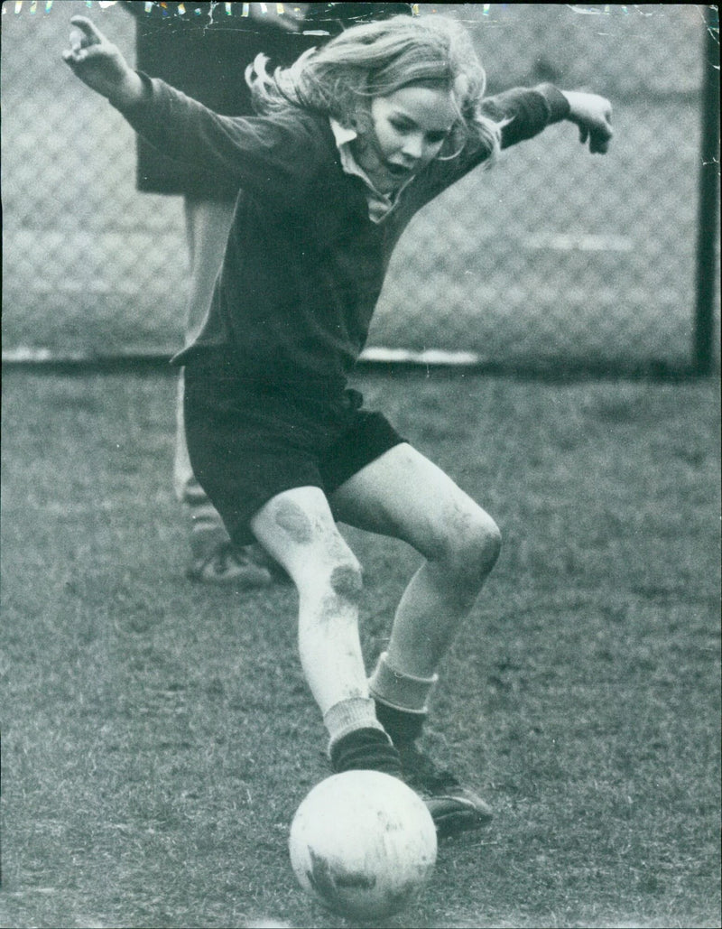 Students from Dragon School play a game of football on March 9, 1973. - Vintage Photograph