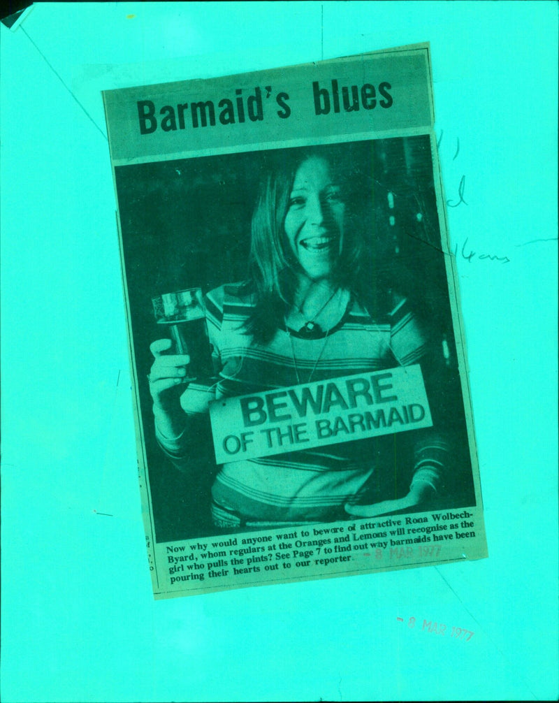 Barmaid Rona Wolbech-Byard serving customers at the Oranges and Lemons pub. - Vintage Photograph