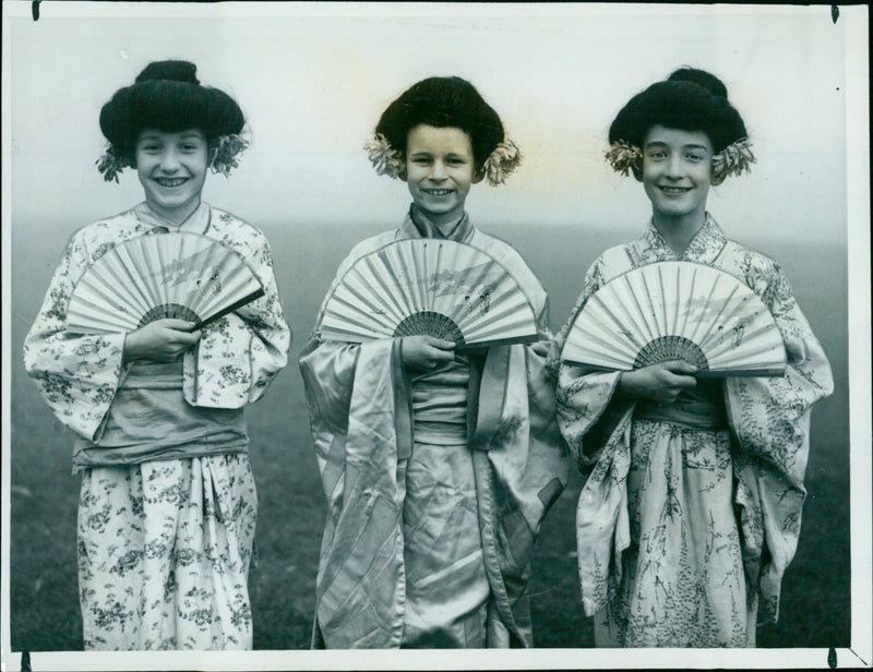 Three boys from the cast of "The Mikado" pose together in costume. - Vintage Photograph