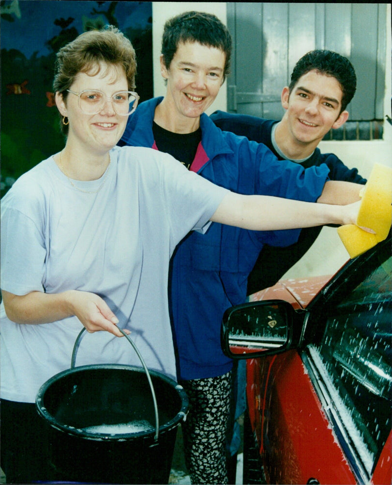 A group of students from Northern School South Paradí take part in a car wash and fete. - Vintage Photograph