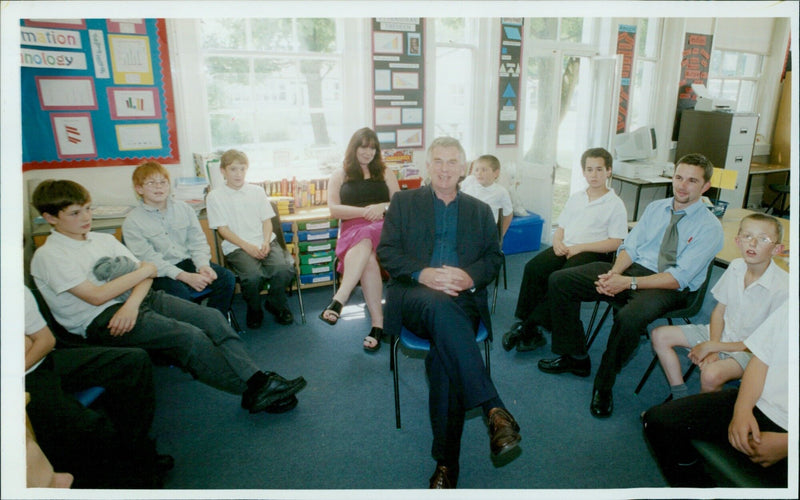 Roy Howarth, Head of Northern House special School, interacts with pupils. - Vintage Photograph