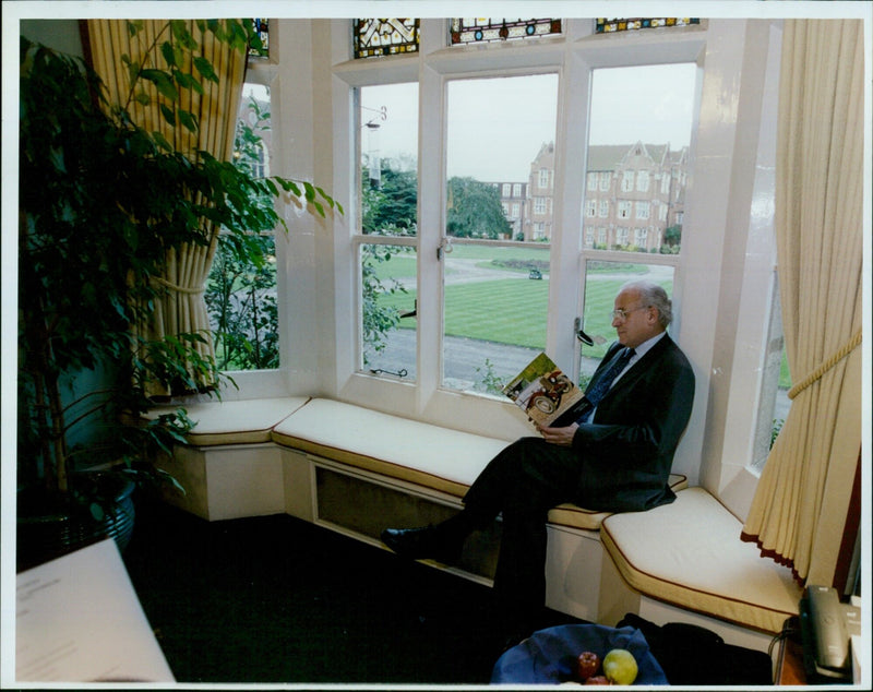 David Christie, Warden of St Edwards School, auctions off photos for Oxford Times. - Vintage Photograph