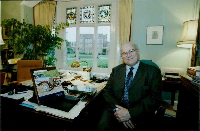 Warden of St Edwards School David Christie holds the Auction Brochure Pics for the Oxford Times. - Vintage Photograph