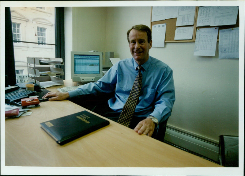 John Moyle, the Chairman of Boswells, and Vince Bramble, the Sainsbury Manager, meet in Oxford to discuss the future of the Central Retail and Business Group. - Vintage Photograph