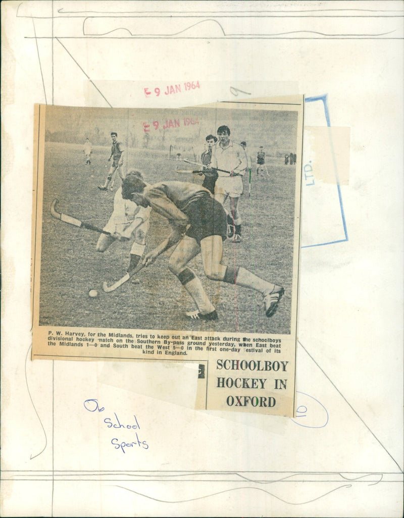 Schoolboys from the East, Midlands, South, and West divisions battle it out in a one-day hockey festival in Oxford on January 9th, 1964. - Vintage Photograph