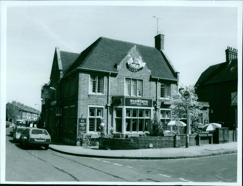 A traditional beer is loaded into the Anchor Pub on Kingston Road in Oxford, England. - Vintage Photograph