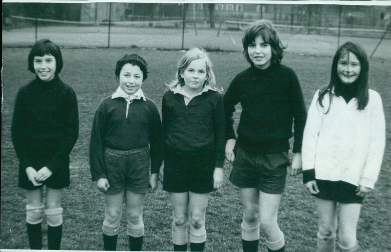 Girls from the Dragon School in Oxford show off their football skills. - Vintage Photograph