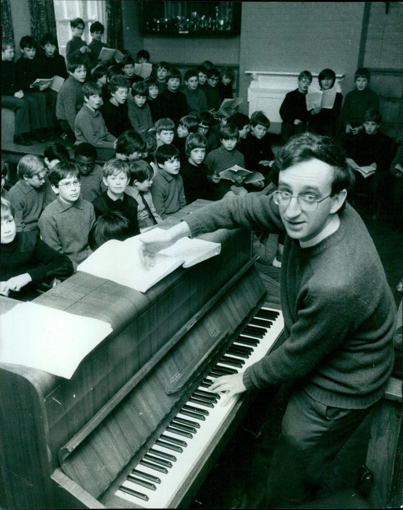 Pupils at the Christ Church Cathedral School, Oxford, rehearse for their upcoming opera production. - Vintage Photograph