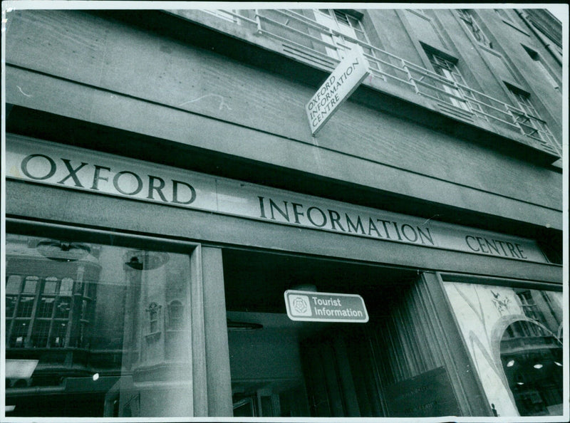 A group of people outside the Oxford Centre in Oxford, England. - Vintage Photograph