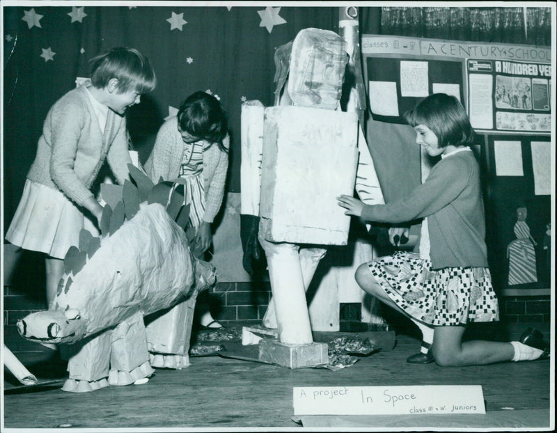 Students at A Century School in Oxford, UK, learn in a space-themed classroom. - Vintage Photograph