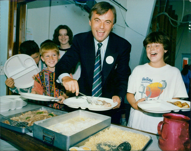 Andrew Smith, Member of Parliament, dines with students at Weskey Green School. - Vintage Photograph