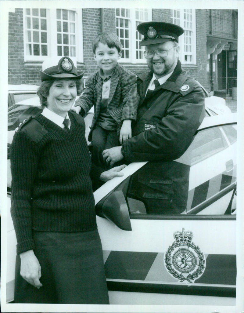 Ambulance service personnel visit West Oxford Primary School to discuss services and safety with students. - Vintage Photograph