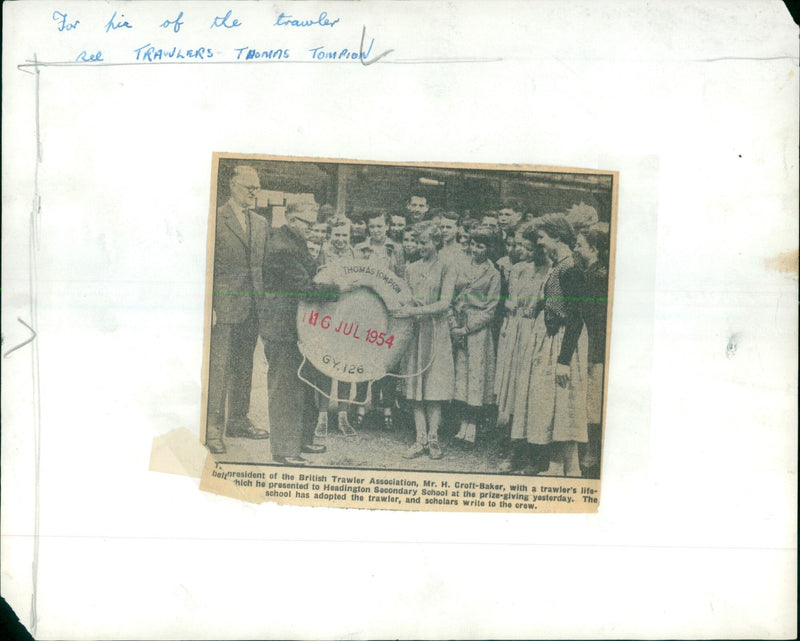 Mr. H. Croft-Baker presents a trawler's life-ring to Headington Secondary School at a prize-giving ceremony. - Vintage Photograph