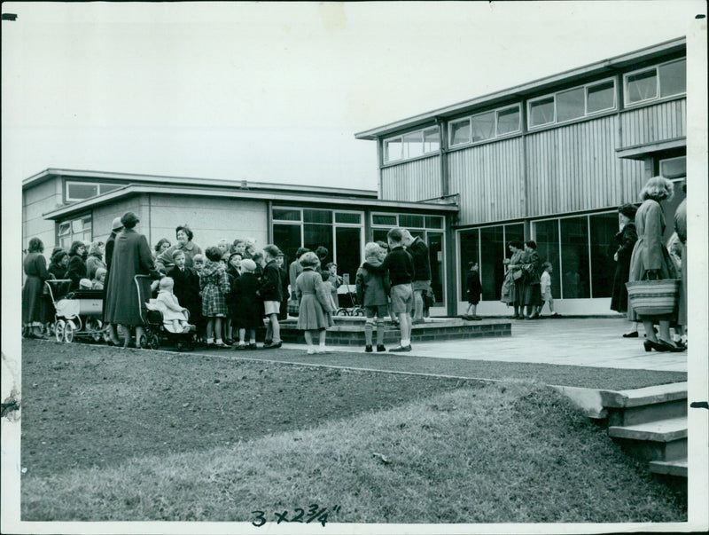 Students boarding a school special bus in Oxford, England. - Vintage Photograph