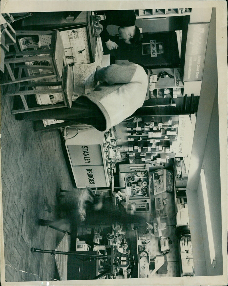 Employees of ARCOY Universal Aw Guide demonstrate the use of better class tools for powered gardening. - Vintage Photograph