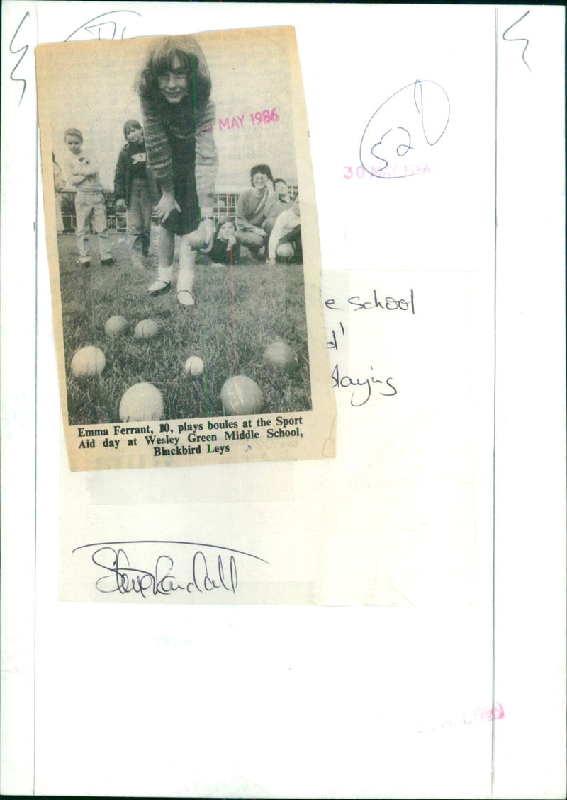 Emma Ferrant, 10, playing boules during Sport Aid day at Wesley Green Middle School. - Vintage Photograph