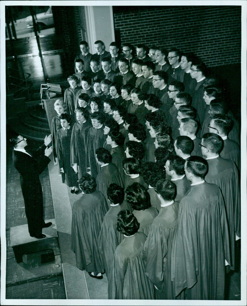 The Wittenberg Choir of Springfield, Ohio, U.S.A. performs in an artan Cal Chapel. - Vintage Photograph