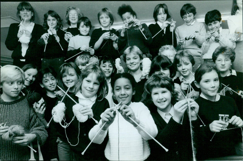 A student knits a blanket at Bislisp Si Kirk school in Sunsetaan. - Vintage Photograph