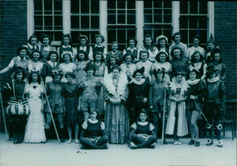 Mary Pollicott, second from right in the back row, performs in "Merry England" at Oxford Central Girls School. - Vintage Photograph