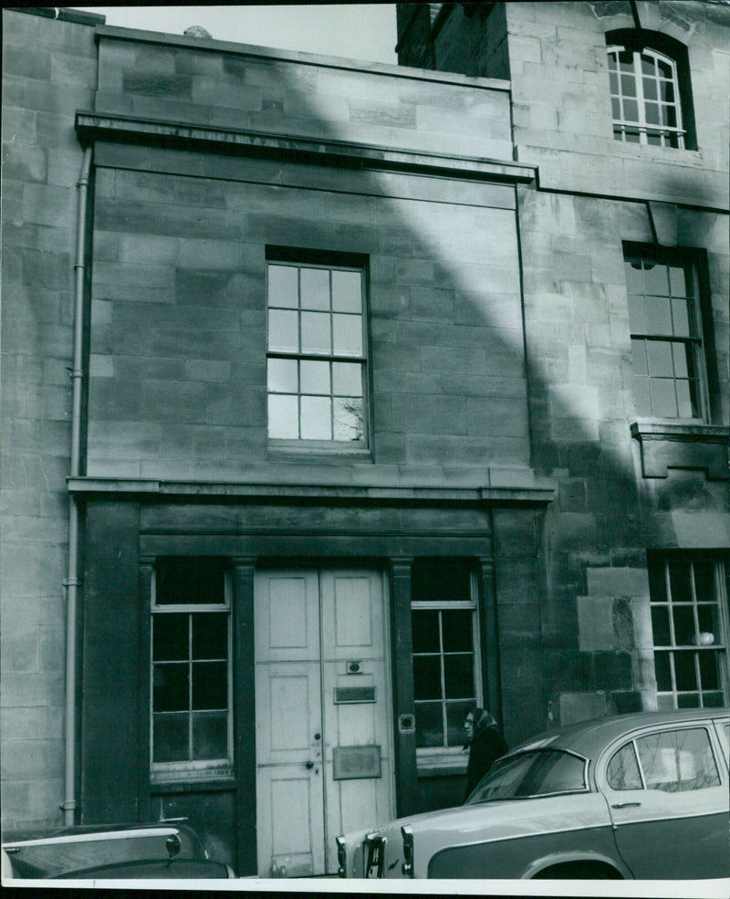 Students walking along 22 St Michael St in Oxford, England, on January 5, 1965. - Vintage Photograph