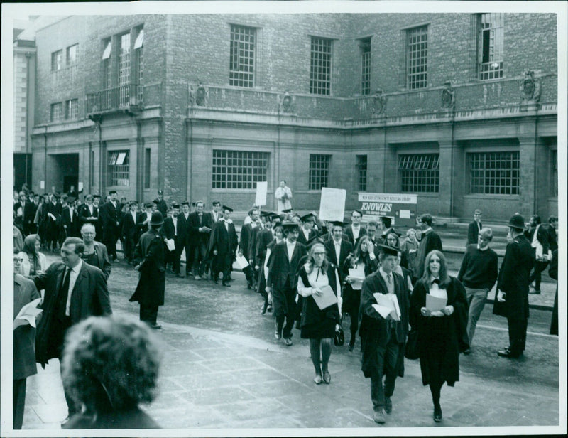 A protester holds a sign during a demonstration against the government's handling of the Covid-19 pandemic in London on February 21, 2021. - Vintage Photograph