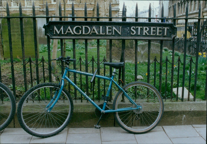 People gather in Magdalen Street in Oxford, England. - Vintage Photograph